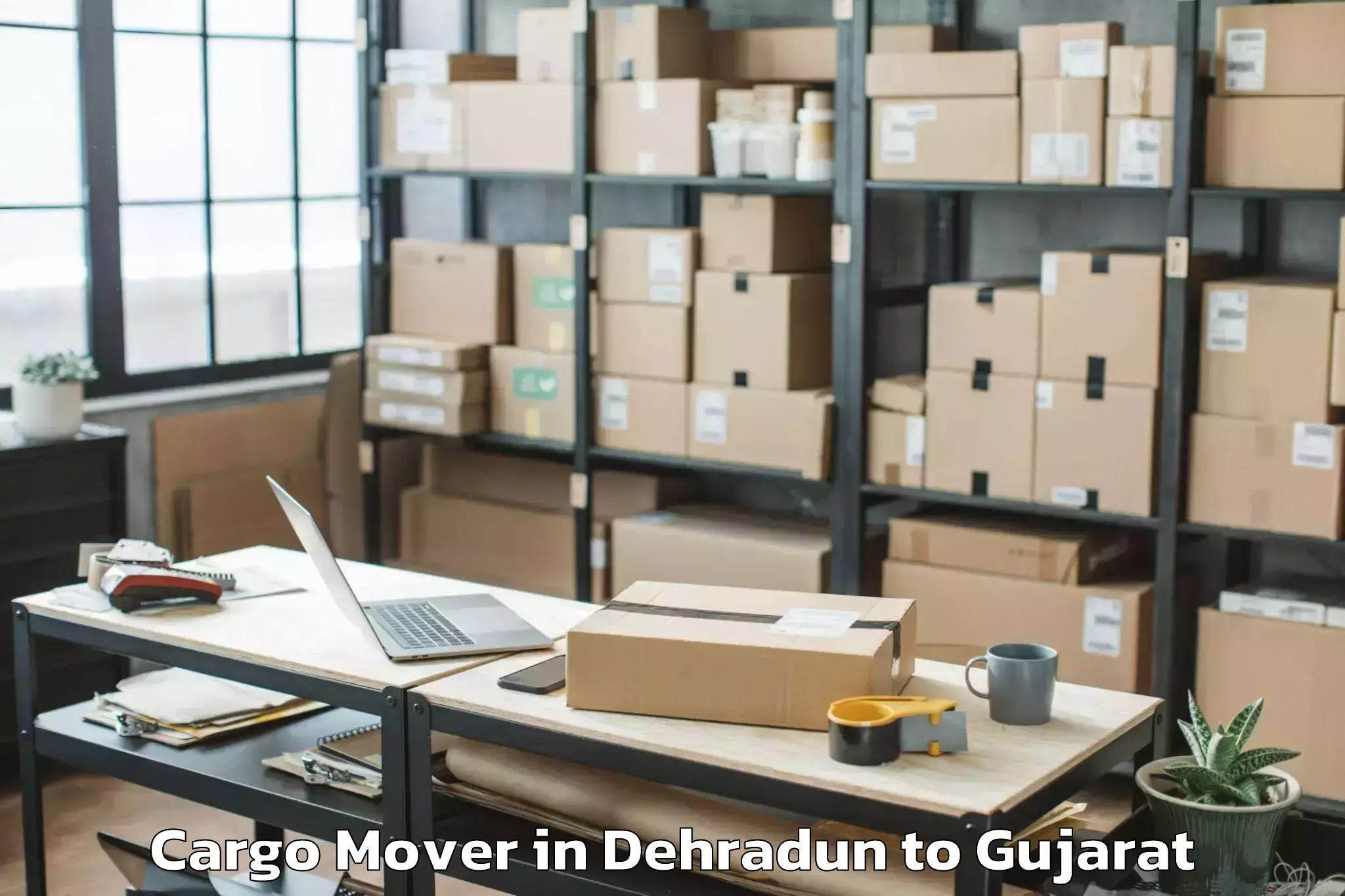 Expert Dehradun to Visavadar Cargo Mover